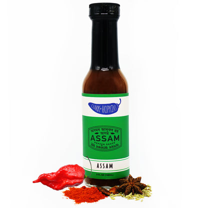 ASSAM front bottle ghost pepper spices star anise